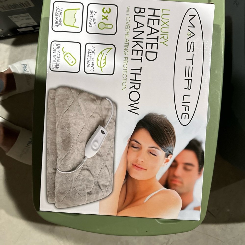 Luxury heated blanket throw